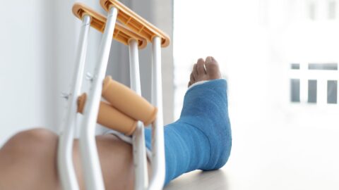 injured leg using crutches