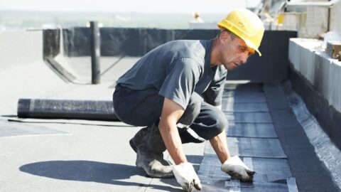 Roofer on hot roof in the heat